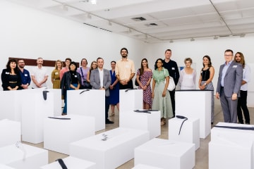 Members of QAGOMA Foundation’s Future Collective with artist Dale Harding at his exhibition at Brisbane’s Institute of Modern Art