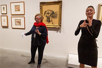 ‘A Generous Life’ included many of the acquisitions that Olley supported for public collections around Australia. Here, a volunteer guide and an Auslan interpreter discuss Edgar Degas’s After the bath c.1900
