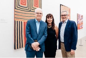 Comedian, banjo player and collector of Indigenous Australian art, Steve Martin tours the Gallery with Director Chris Saines and Acting Curator of Indigenous Australian Art, Katina Davidson